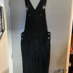 Free People dark grey/washed black overalls mid rise with flared legs. Size 30